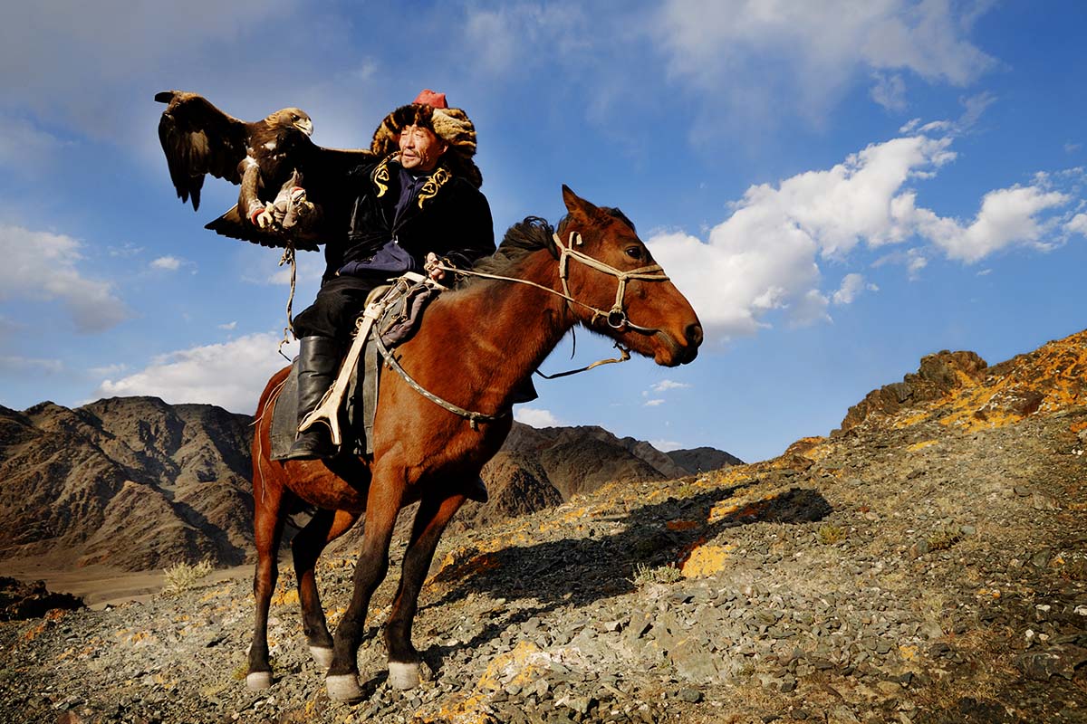 mongolian man on horse