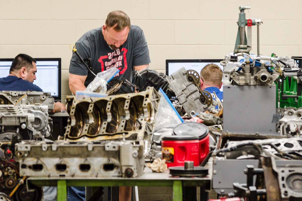 students in auto tech classroom