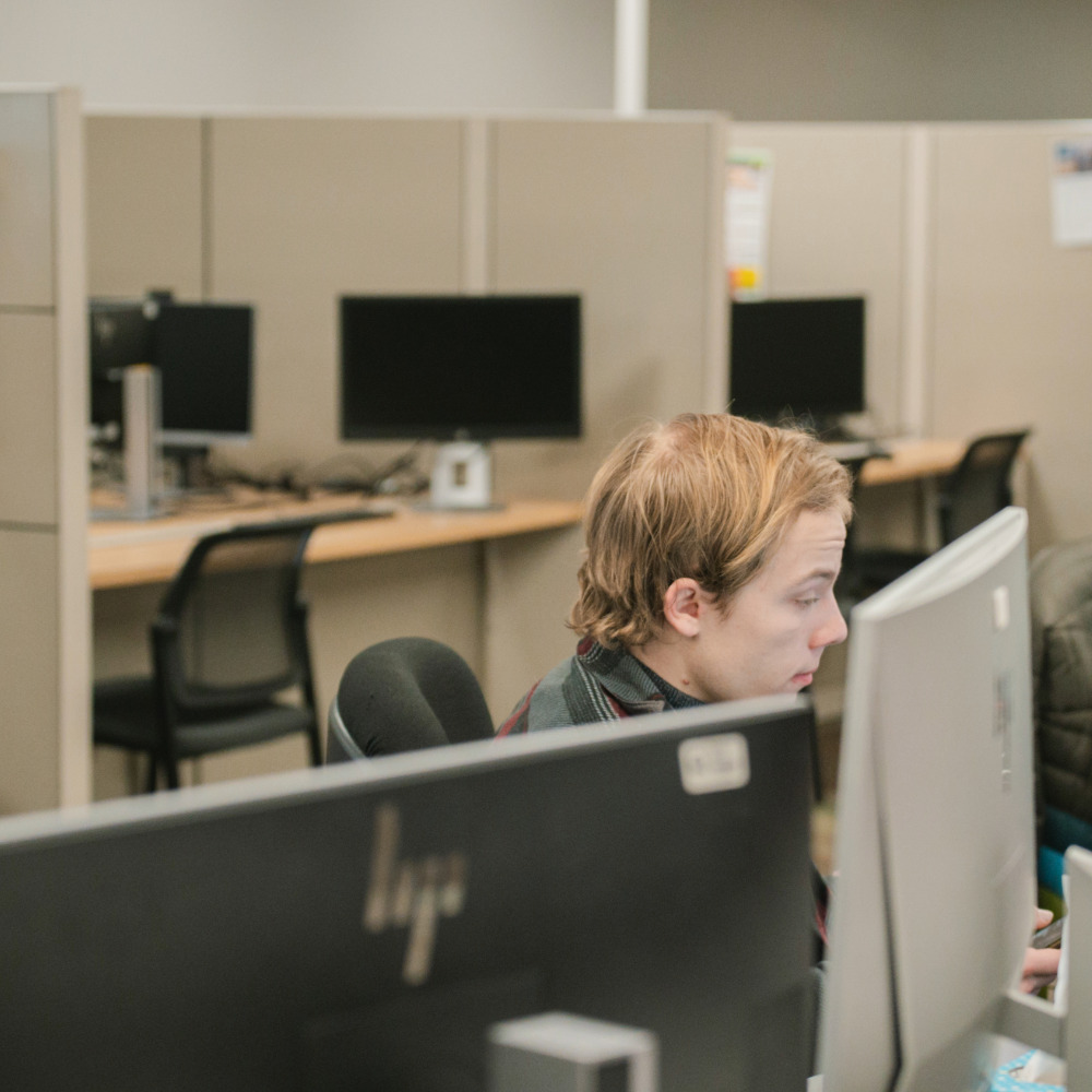 student working on computer