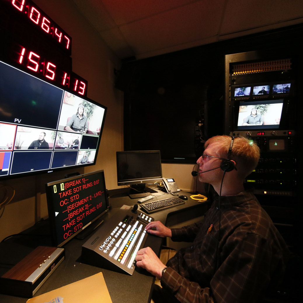 broadcasting student in a booth