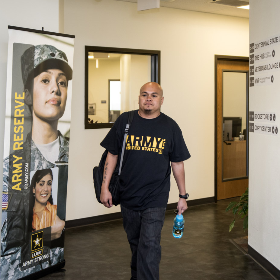 student wearing Army shirt