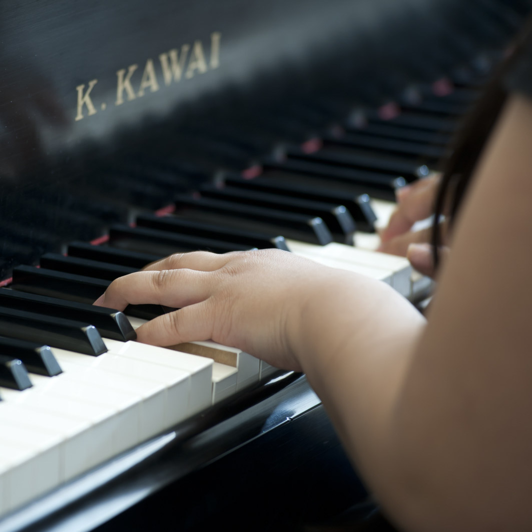 Student playing piano 