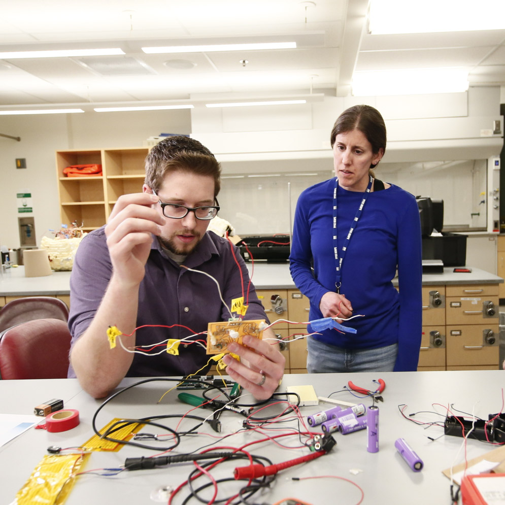 Teacher and student in Electronics classroom