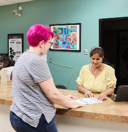 Student and Staff at Front Desk Student and Staff at Front Desk