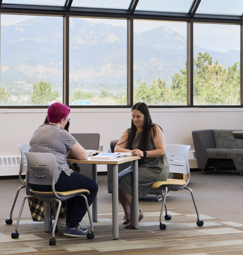 students in centennial library