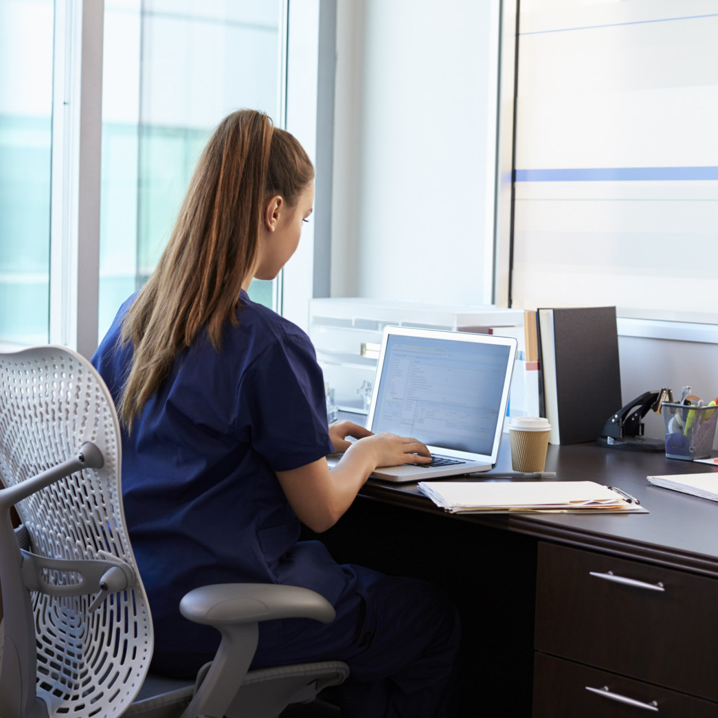 Nursing student working on computer