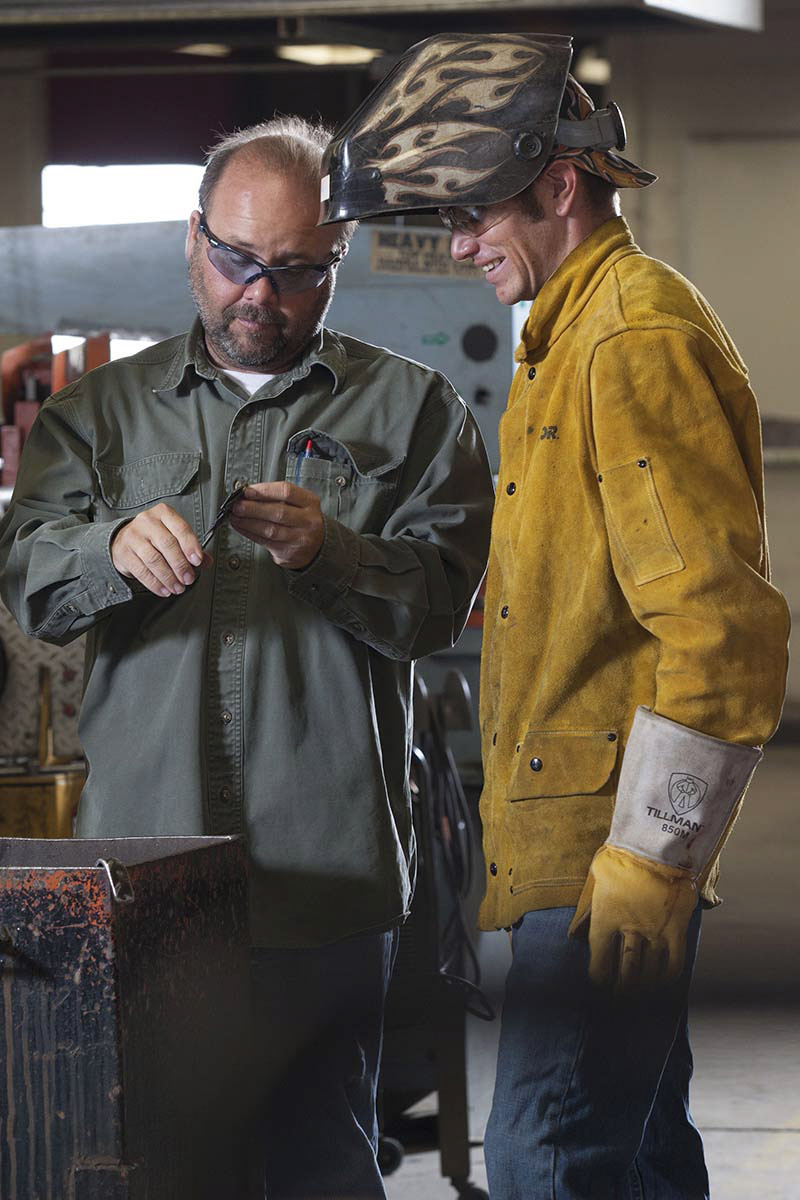 student learning about welding