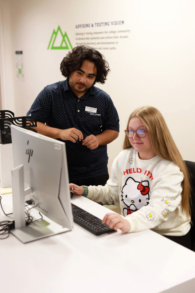 student working with academic advisor