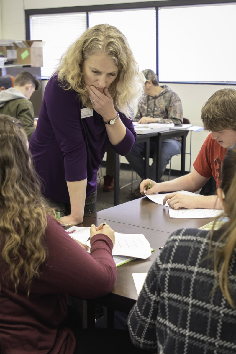 instructor assisting students