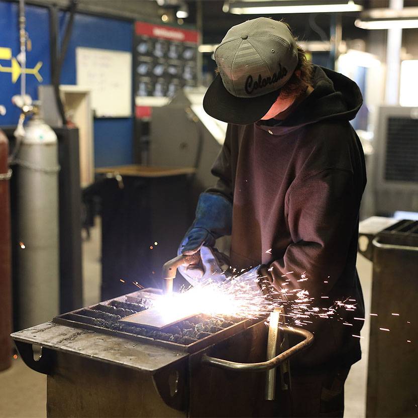 Student in a welding lab