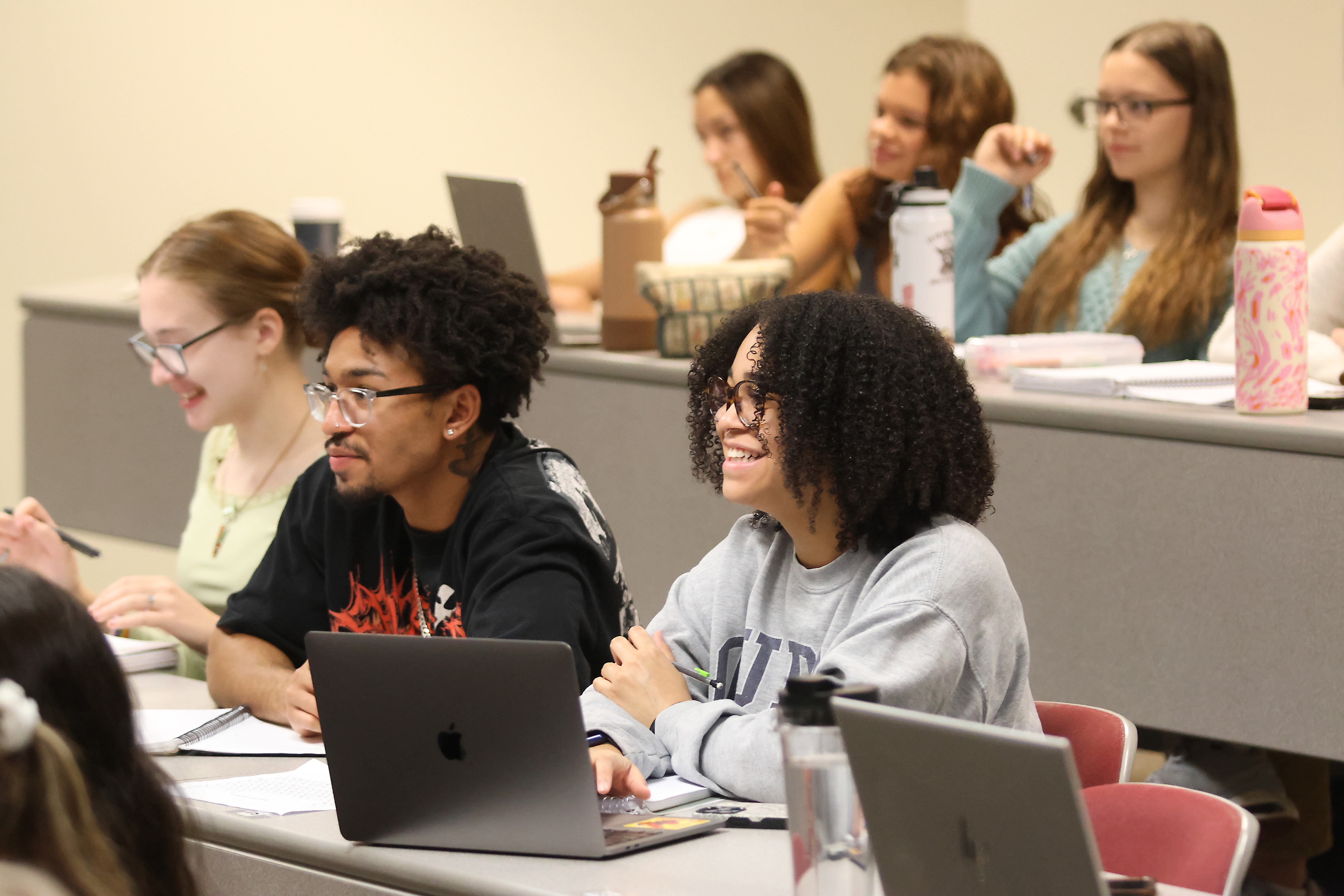 students smiling during lecture class