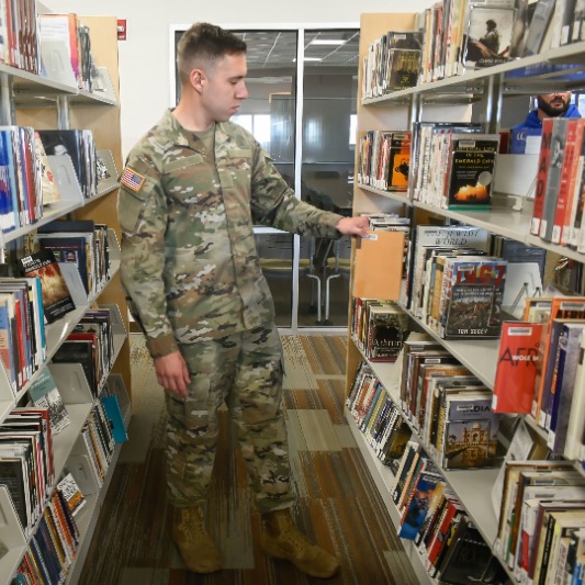 active duty student browsing books