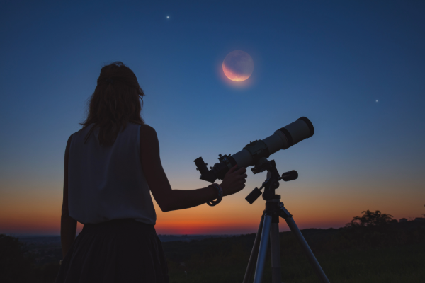 astronomy stock photo of person with telescope